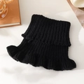 Black knitted neck warmer with elegant ruffled edge detail on a flat white surface - Adult Neck Warmer - Black