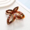 Detailed view of large tortoiseshell acetate claw clip with amber butterfly wing patterns - Multicolor Marble (6)