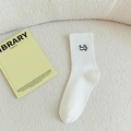 White cotton crew sock with cute black emoji embroidery on a soft textured background - Greedy Ghost / White (Greedy Ghost)