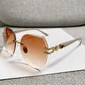 Lunettes de soleil sans monture avec verres dégradés marron et détails grecs dorés - Monture Dorée Verres Ambrés Dégradés