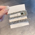 Sparkling gold hair clips set with crystal texture on a white display card - Silver Grey Crystal Set