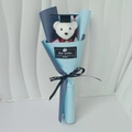 Detail of graduation teddy bear with sunflower soap flowers in blue wrapping paper - Sapphire Blue