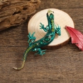 Vintage lizard brooch with emerald green gemstones and enamel on a rustic wood base - Green Enamel with Emerald Stones