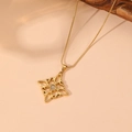 Macro view of gold hollow square knot pendant with cat eye stone and cubic zirconia details - Gold Style 7 (C414)
