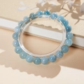 Macro shot of light blue aquamarine beads with a polished finish and clear texture - 8mm Specification (With Gift Box)