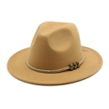 Detailed macro view of camel wool fedora hat with braided band and vintage metal beads - Camel