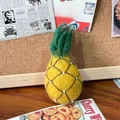 Handmade wool felt pineapple keychain accessory with green leaves and white beads detail - Beaded Pineapple
