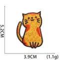 Cute orange cartoon cat embroidery patch measuring 5.2cm by 3.9cm for clothing repair - Yellow Orange Cat Patch (W17XM-092-09)