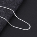 Close-up of a sleek silver flat snake chain necklace with high-gloss polished finish - Silver Blade Chain 3mm Wide 40+5cm