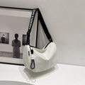 White crescent crossbody bag with adjustable lettered strap and knotted charm detail - Black and White Without Pendant