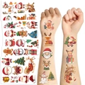 Set of Christmas temporary tattoos with Santa and reindeer designs on white background - Christmas Series 3