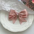 Pink satin bow hair claw clip with heart-shaped crystal rhinestone in a ceramic dish - Pink Satin Heart Rhinestone Style / Pink Bangs Rhinestone Side Clip