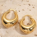 Polished 14K gold plated chunky teardrop hoop earrings on natural stone background - Mirror Waterdrop Style
