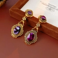 Orecchini vintage in oro con zirconi ovali viola e montatura floreale retrò - Stile Ovale Sfumato (Perno in Argento Sterling 925)