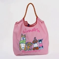 Pink nylon tote bag featuring colorful dog embroidery and brown woven rope handles - Pink Shiba Inu