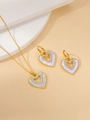 Detail of gold heart necklace and earrings set with pearl inlay and crystals - White Mother Of Pearl Heart Rhinestone Necklace And Earrings