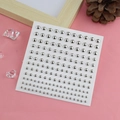 Sparkling silver round rhinestone face stickers for makeup decoration on pink background - Silver Lip Stud Round Beads