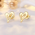 Elegant 18K gold plated hollow heart stud earrings for women with a minimalist design - Gold