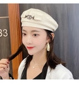 Fashionable beige faux leather beret hat for women with a stylish metal buckle detail - One Size 58cm / Beige V Logo Style