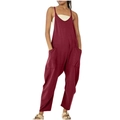 Detailed close-up of loose-fit burgundy jumpsuits featuring large side pockets and spaghetti straps - Burgundy