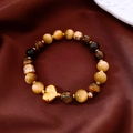 Close-up of 18k gold plated tiger eye stone bracelet with heart pendant on silk background - Heart Pendant Style (Gold-Coffee)