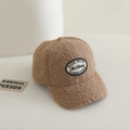 Detailed close-up of camel fleece baseball cap with vintage embroidery on white surface - 54-56cm (approx. 4-10 years) / Khaki