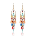 Detail of bohemian long tassel earrings with vibrant multi-colored beads and gold hooks - Style 2085 / Dark Multi
