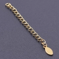 Golden 5cm necklace extender chain with oval pendant on textured black background - S1657 Teardrop Tag / Gold