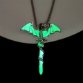 Luminous dragon wrapping around a sword pendant glowing green in dark background - Green