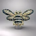 Cute golden bee brooch with black enamel wings and sparkling white crystals - Style 34