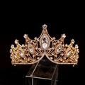 Elegant gold bridal crown featuring intricate crystal embellishments on a black background - Large V-Shaped Gold With White Rhinestone
