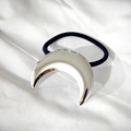 Sleek minimalist silver crescent moon metal hair tie on premium white silk fabric - Silver Crescent