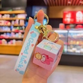 Llavero mini cubo Sanrio Cinnamoroll y My Melody con correa de mano de silicona - Cubo de Dibujos Animados Azul