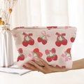 Beige corduroy cosmetic bag with red strawberry and pink bow print and gold zipper - Beige Strawberry Bow (MT0226025)