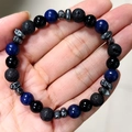 Close-up of 8mm beaded bracelet with turquoise, lava rock, and hematite on hand - Lapis Lazuli Lava Rock Polished Stone Mix