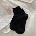 Calzini neri in maglia con bordi in pizzo a balze e fiocco di seta decorativo - Nero