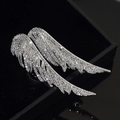 Elegant silver angel wing brooch pin with shimmering zircon crystals and feather details - Silver Wings Flying Together