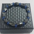 Lava stone energy bracelet with dark grey magnetic stones and blue faceted crystal beads - Diamond
