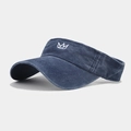 Detail of navy washed denim visor featuring white crown embroidery and distressed edges - Adjustable / Navy Blue