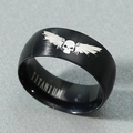 Gothic black titanium ring featuring skull and wings engraving from a 45-degree angle - US 13 / Black Skull Wings Pattern