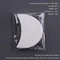 Pack of 50 crescent-shaped white non-woven eyeshadow pads 8x8cm for makeup application - 50Pcs/Large/OPP Bag