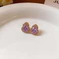 Elegant gold earrings with gourd-shaped purple zircon stones on a white ceramic tray - Purple Zircon Gold Base Gourd (20# Silver Needle-Gold-Purple)