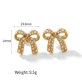 Detailed view of bow earrings with pearls and rhinestones showing 23.8mm x 24mm size - 18K Gold