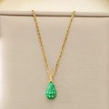 Detailed view of a gold chain necklace featuring a fresh green strawberry fruit pendant - Avocado Style (KN292084-Z)