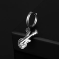 Detailed view of polished stainless steel guitar pendant earrings on a black background - Guitar