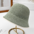 Detail of light green crochet bucket hat with contrast brim on metal stand - M (56-58cm) / Gray