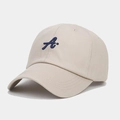 Detailed view of the 3D embroidered blue letter A on a beige cotton baseball cap - Adjustable / Khaki