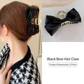 Elegant black silk bow hair claw clip for women, size 12x4cm with golden metal grip - Bow / Black