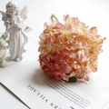 Detailed close-up of pink and cream vintage faux hydrangea with realistic burnt edges - Champagne Pink