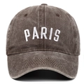Macro shot of PARIS letter embroidery on washed cotton vintage baseball cap - Coffee